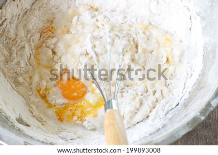mixed yolk eggs, flour and sugar prepare for baking cake or bake