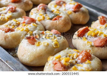 sweet bread with corn and sausages