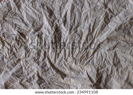 Crumpled grey color tissue paper