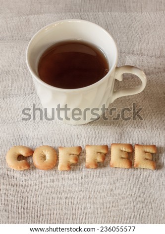 Cookies ABC containing letters, with tea