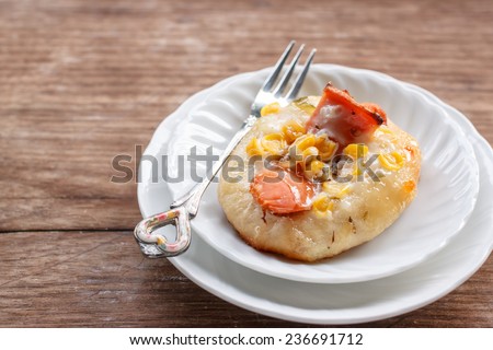 sweet bread with corn and sausages