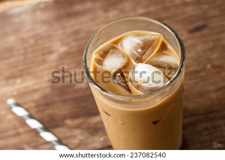 Glass Of Cold Coffee On Wood