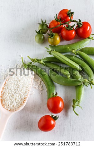 Abstract fresh organic vegetables on white wooden. Food background. Healthy food from garden