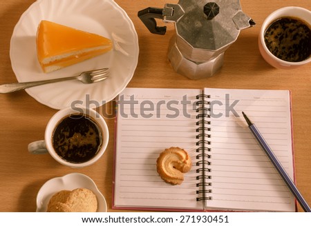 orange cake , butter cookies with espresso coffee in cafeteria