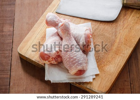 Raw food: Chicken legs put on cutting board prepare for cook.