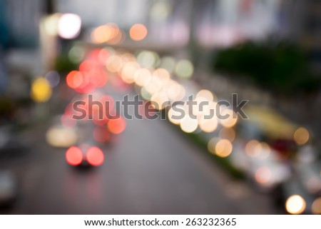 Blurred traffic lights in twilight time , blurred background