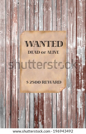 Wanted dead or alive on a wooden wall