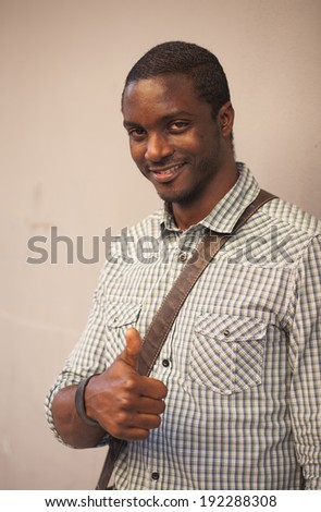 Afro-american man thumbs up