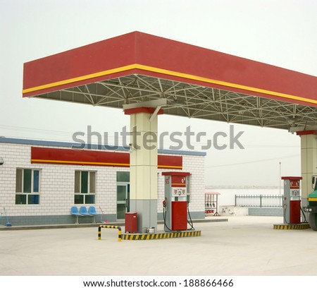 Filling station of the red building.