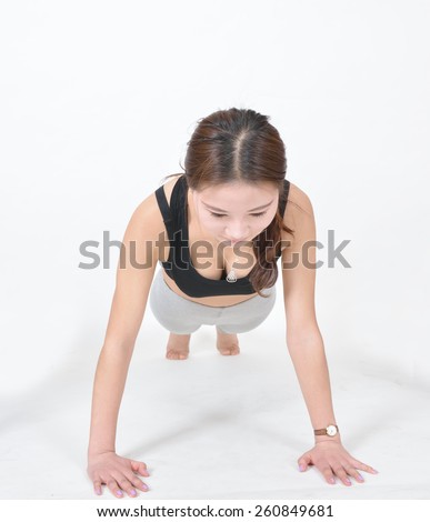 Women do push-ups isolated on a white background