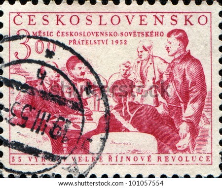 CZECHOSLOVAKIA - CIRCA 1952: A stamp printed in Czechoslovakia honoring 35th Anniversary of Russian Revolution, shows Lenin, Stalin and Revolutionaries, circa 1952