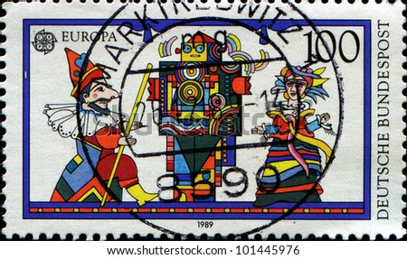GERMANY - CIRCA 1989: A stamp printed in German Federal Republic shows Children\'s Toys, Puppet show, circa 1989
