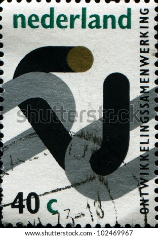 NETHERLANDS  - CIRCA 1973: A stamp printed in Netherkands honoring International Development Co-operation, circa 1973