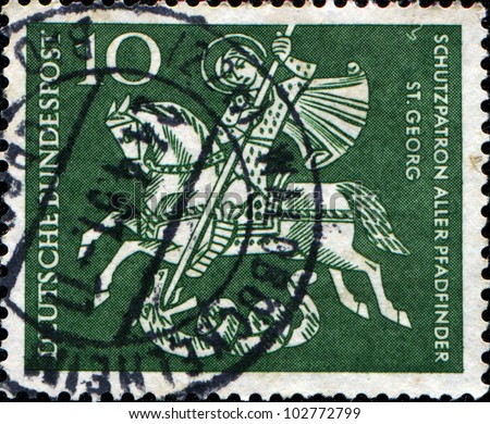 GERMANY - CIRCA 1961: A stamp printed in the German Ferderal Republic shows St. George Killing the Dragon, patron saint of Boy Scouts, circa 1961