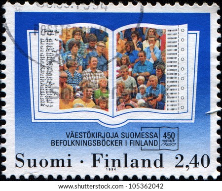 FINLAND - CIRCA 1994: A stamp printed in Finland honoring 450th Anniversary of Population Registers, shows Crowd on Registration List, circa 1994