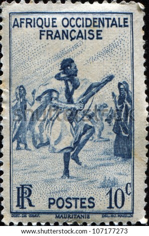 FRANCE - CIRCA 1947: A stamp printed for French West Africa shows War Dance , circa 1947