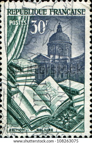 FRANCE - CIRCA 1954: A stamp printed in France  dedicated to Book manufacture, in the background of the dome of the French Academy, circa 1954
