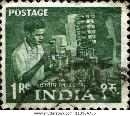 INDIA - CIRCA 1954: A stamp printed in India shows man  Telephone engineer, series, circa 1954