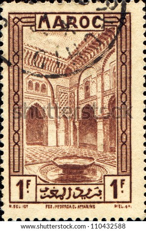 MOROCCO - CIRCA 1932: A stamp printed in Morocco shows educational Institution Medersa el Attarine school, circa 1932