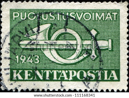 FINLAND - CIRCA 1943: A stamp printed in Finland (Kenttapostia Military Postal) shows sword and horn, circa 1943