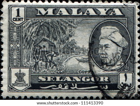 MALAYA - CIRCA 1957: A stamp from state Selangor of the Federation of Malaya shows making copra and portrait of Sultan Hisamud-din Alam Shah, circa 1957