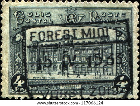 BELGIUM - CIRCA 1929: A stamp printed in the Belgium shows Post Office in Brussels, circa 1929
