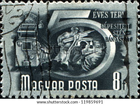 HUNGARY - CIRCA 1950: A stamp printed in Hungary shows image celebrating the five year plan for the mechanisation of the coal mining industry, series, circa 1950