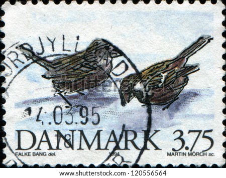 DENMARK - CIRCA 1994: A stamp printed in  Denmark shows  House Sparrows - Passer domesticus , circa 1994