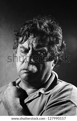 weary middle-aged man, black and white