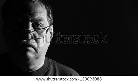 middle-aged man in eyeglasses, black and white