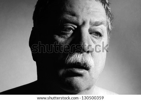 weary middle-aged man, black and white