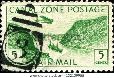 PANAMA CANAL ZONE- CIRCA 1931: A stamp printed in Panama Canal Zone shows a Steamer in Panama Canal, circa 1931