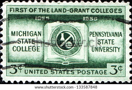 USA - CIRCA 1955: A stamp printed in United States of America shows coat of arms of Michigan State College, Pennsylvania University, First of the Land-Grant Golleges, circa 1955