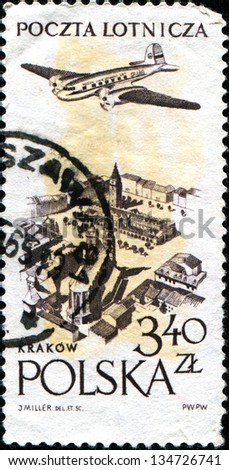 POLAND - CIRCA 1957:A stamp printed in Poland shows plane flying over Krakow, circa 1957
