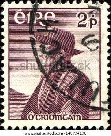 IRELAND - CIRCA 1956: A stamp printed in Republic of Ireland shows famous author Tomas O\'Criomtain commemorating the anniversary of his death, circa 1956