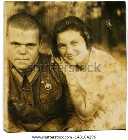 USSR - CIRCA 1930s: Vintage photo shows Red Army commander with wife, 1930s