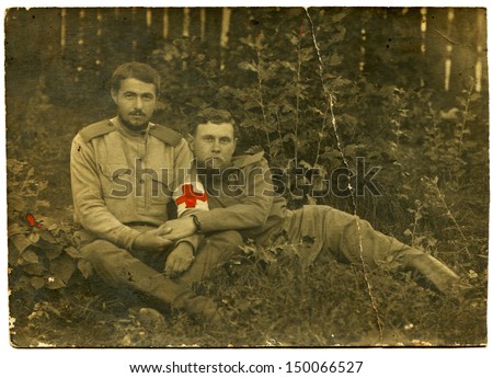 RUSSIAN EMPIRE - CIRCA 1914 - 1917: Antique photo shows two soldiers of medical service, period of World War First, 1914 - 1917