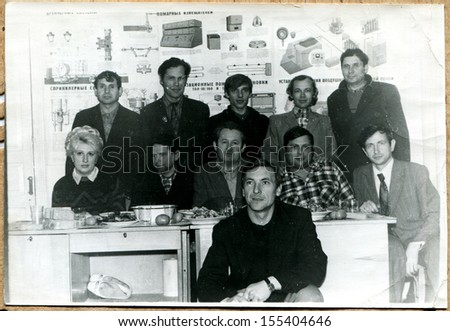 UKRAINE - CIRCA 1969: An antique photo shows radio workshop staff, Voroshilovgrad, now Lugansk, 1969