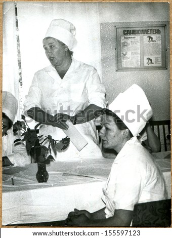 UKRAINE - CIRCA 1964: An antique photo shows nurses in Oncology dispensary Voroshilovgrad, now Lugansk, 1964