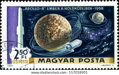 HUNGARY - CIRCA 1969: A stamp printed in Hungary shows rockets  Apollo 8 in Orbit around Moon,, circa 1969