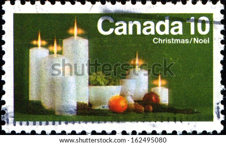 CANADA - CIRCA 1972: A stamp printed in  Canada shows Candles and Fruit, Christmas, circa 1972