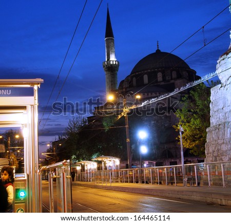 ISTANBUL - Apr 21: Atik Ali Pasa mosque on  Divan yolu near Grand Bazaar at night on April 21, Istanbul, Tirkey. Divan yolu is the main avenue through historic Istanbul.