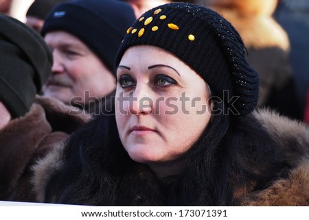 UKRAINE,LlUGANSK - JANUARY 25, 2014: rally participants The Party of Regions organized a pro-government rally in Lugansk. It was attended by members of the city\'s ten largest businesses, Enterprise.