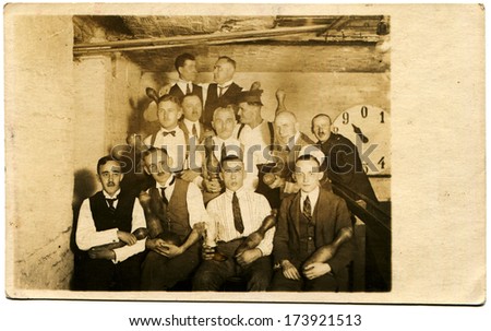 GERMANY - 1920s: An antique photo shows group of men in white shirts and ties