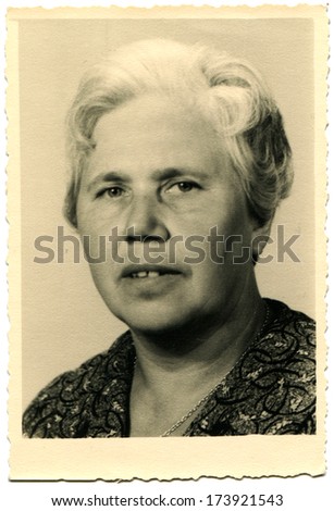 GERMANY, ROSTOCK - 1950s: An antique photo shows studio portrait of middle aged woman