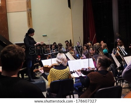 UKRAINE, LUGANSK - February 25, 2014: Lugansk Symphony Orchestra prepares for the upcoming concert, which will be executed works of Saint-Saens and Brahms