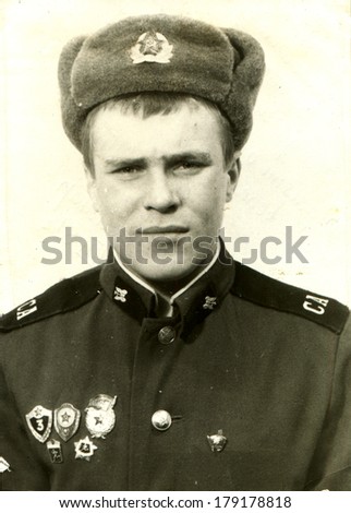 GERMANY, WEIMAR - March 2, 1981: A photo of soldier of Soviet Army in cap with ear-flaps