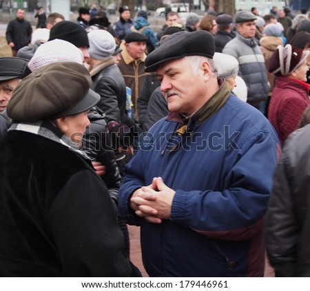 UKRAINE, LUGANSK - March 2, 2014: Protesters rally in Lugansk urging Russia not to interfere in affairs of Ukraine and other countries to send troops to country. The rally was held under police guard.