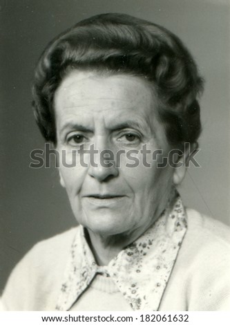 GERMANY - CIRCA 1950s: An antique studio studio portrait of an old woman