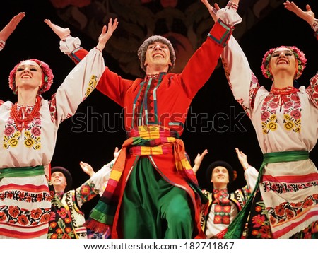 UKRAINE, LUGANSK - MARCH 18, 2014: Ukrainian National Folk Dance Ensemble named After P. Virsky, who is considered best folkloric ballet dancer in country, performed a live show on stage in Lugansk